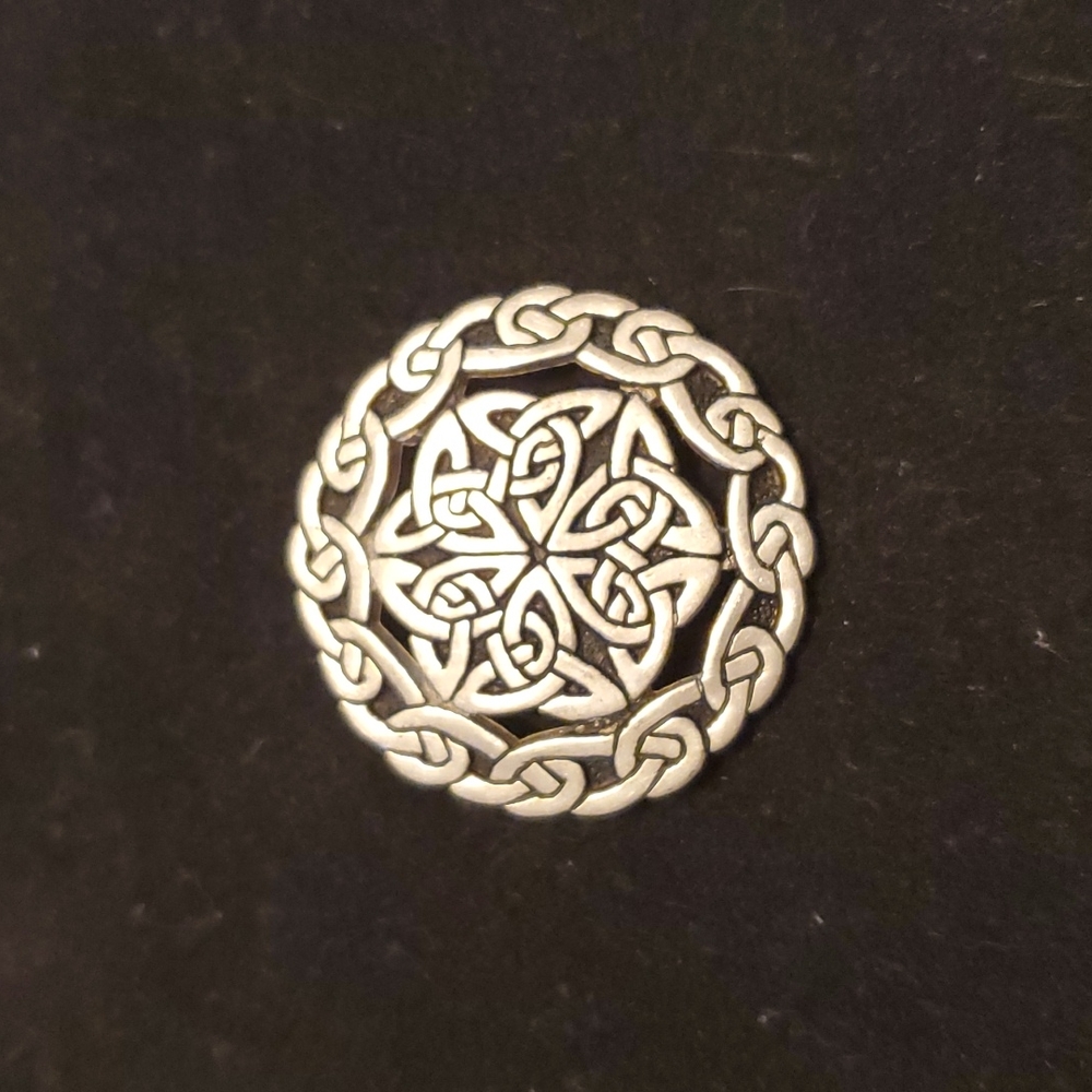 Vintage St. Justin pewter brooch